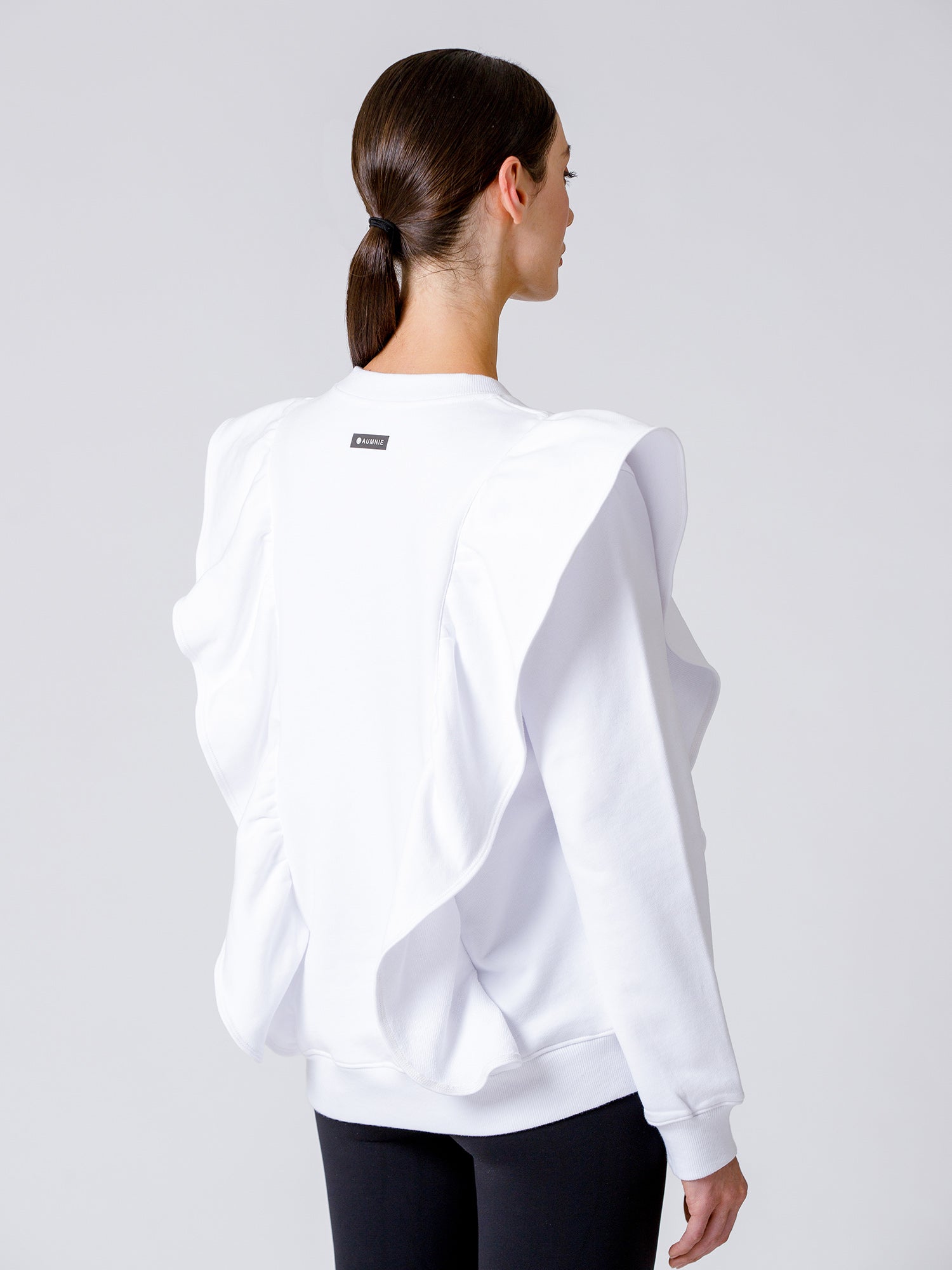 EMPOWER RUFFLED SWEATSHIRT