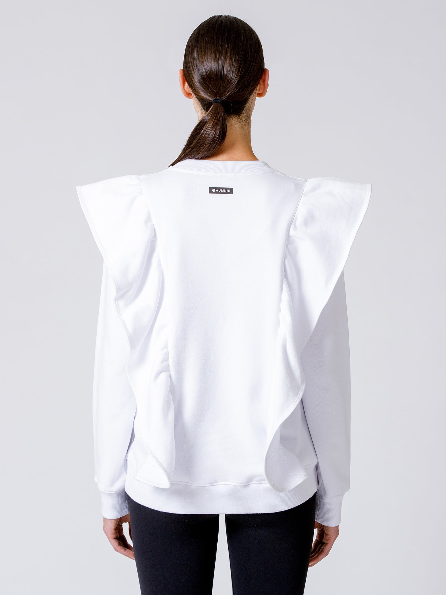 EMPOWER RUFFLED SWEATSHIRT