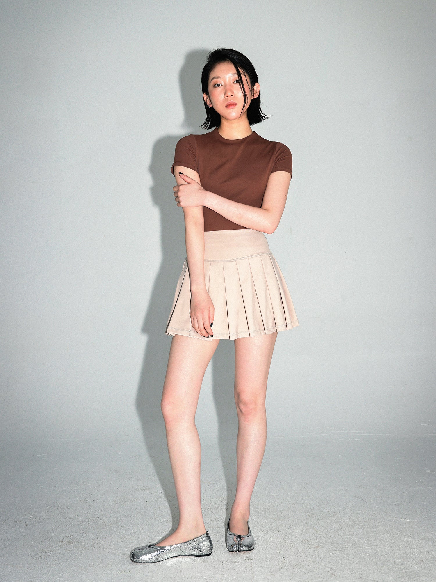 HIGH WAIST PLEATED SKIRT W/ SHORTS