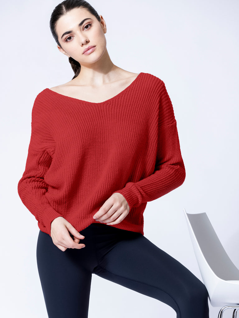 Open back knit sweater with a knot detail in red